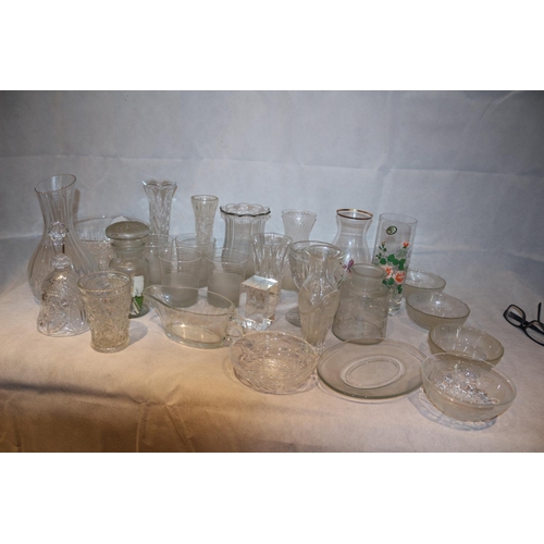 410 - A large assortment of clear glass including a paperweight