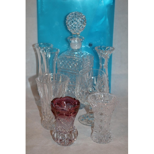 429 - A selection of mixed cut glass decanter's and vases