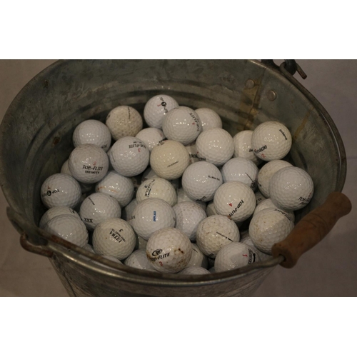 436 - A great one for you golfers, a galvanized bucket full of used golf balls