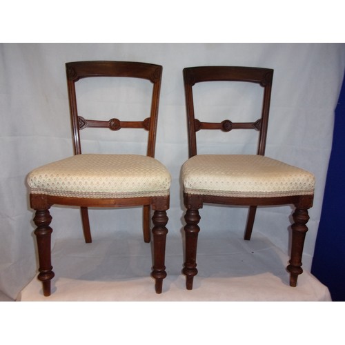 209 - Two Wooden Hall Chairs with Carved motif Backs and Turn Front Legs. One needs back tightening