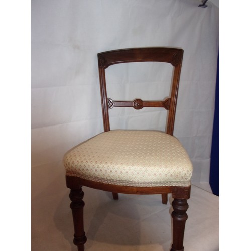 209 - Two Wooden Hall Chairs with Carved motif Backs and Turn Front Legs. One needs back tightening