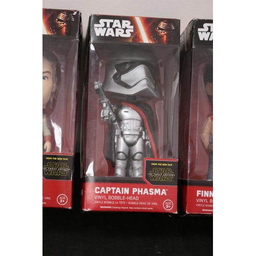 188 - From Star Wars The Force Awakens Vinyl Bobble Head In Boxes Finn, Captain Phasma and Rey