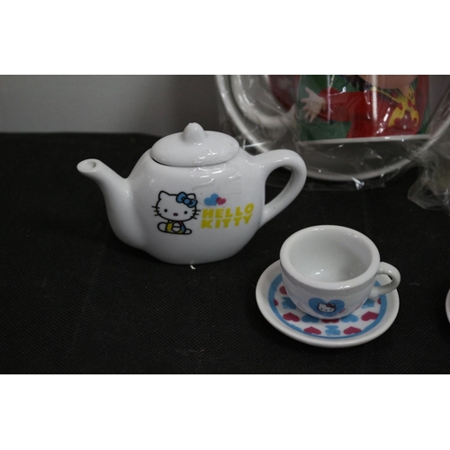 469 - A Hello Kitty Tea Set And Noddy Cup& Bowl