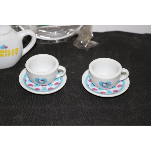 469 - A Hello Kitty Tea Set And Noddy Cup& Bowl