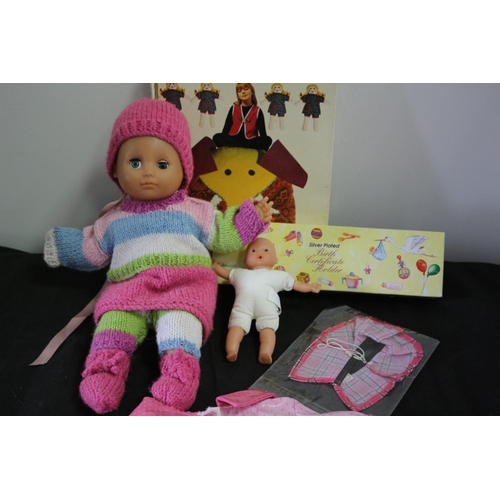 470 - Birth Certificate Holder, 2 Dolls and Book on My Learn to Sew Book