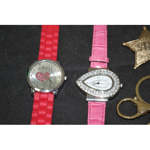 515 - 3 Wrist Watches A Small Crystal Clock and Some Key Rings