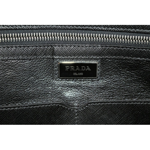 542 - Prada Handbag With Documentation And Dust Bag. Some Small Scuffing