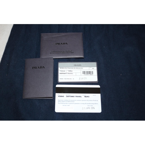 542 - Prada Handbag With Documentation And Dust Bag. Some Small Scuffing