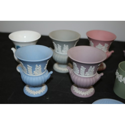 37 - 9 Pieces of Wedgwood In Various Colours Mainly Jasperware including a Vase and Urns