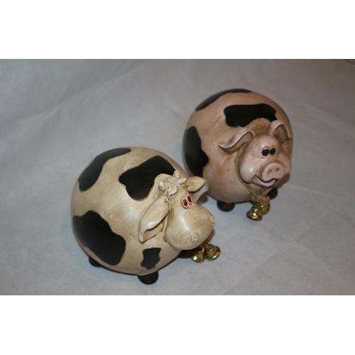 67 - 2 Resin Garden ornaments in the Style of a Pig and Cow