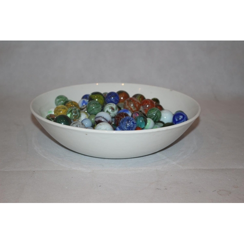 70 - A Bowl with a Large Assortment of Various aged Marbles