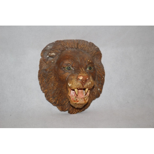 76 - A Wall Plaque in the style of a Lions Head