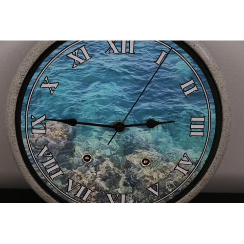 192 - Granite Effect Wall Clock With An Ocean Scene