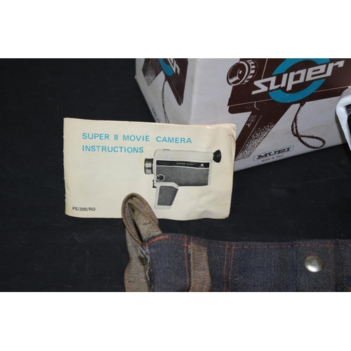 208 - 2 Vintage Super Eight Cine Camera In box with instructions and a Denim Bag untested