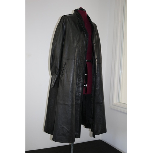 262 - 70's/80's Ladies Black Leather Coat Un-sized. Mannequin not included But see Lot 130