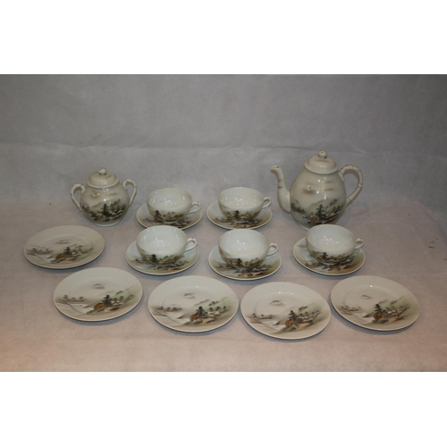 266 - A 17 Piece Decorative Japanese  eggshell tea set. Stamped on bottom