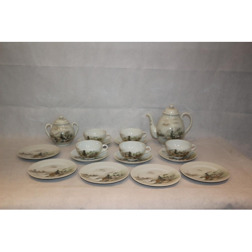 266 - A 17 Piece Decorative Japanese  eggshell tea set. Stamped on bottom