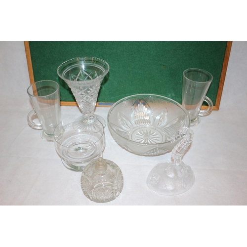 272 - An assortment of Clear glass ware items including cups and vases