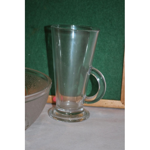 272 - An assortment of Clear glass ware items including cups and vases