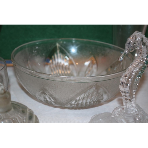 272 - An assortment of Clear glass ware items including cups and vases