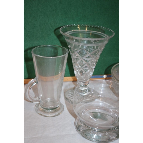 272 - An assortment of Clear glass ware items including cups and vases