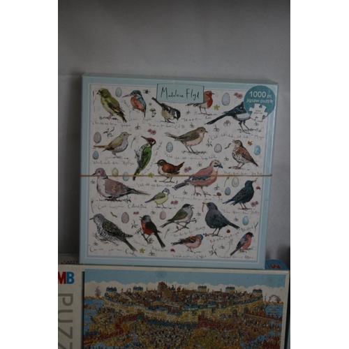 286 - 9 Various sized and themed Jigsaws including 1 