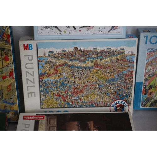 286 - 9 Various sized and themed Jigsaws including 1 