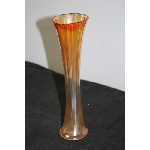 379 - A Carnival Glass Twist Stem Vase 25 CM High. Slight Chip To Base