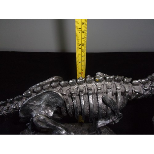 385 - Metal Effect Dinosaur Skeleton sculpture. Sadly Tail Has Damage