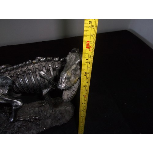 385 - Metal Effect Dinosaur Skeleton sculpture. Sadly Tail Has Damage