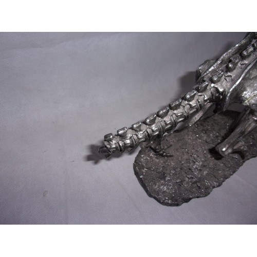 385 - Metal Effect Dinosaur Skeleton sculpture. Sadly Tail Has Damage