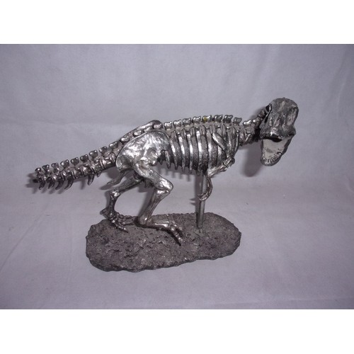 385 - Metal Effect Dinosaur Skeleton sculpture. Sadly Tail Has Damage