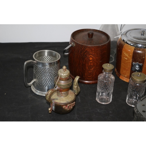 559 - An Eclectic Lot Containing Retro Biscuit Barrel And Ice Bucket And Other Metal And Glassware