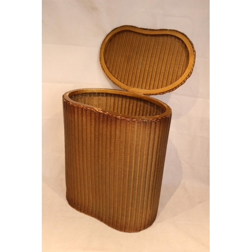 606 - Lloyd Loom Kidney Shaped Laundry Basket. Complete With Lloyd Loom Plaque 