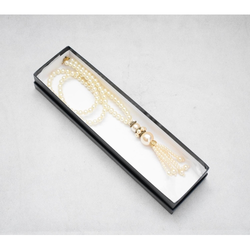 107 - A Pearl Necklace with Tassel in Black Box