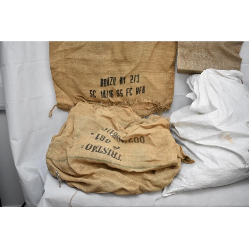 116 - A Large Quantity of Hessian Sacks in Various Sizes