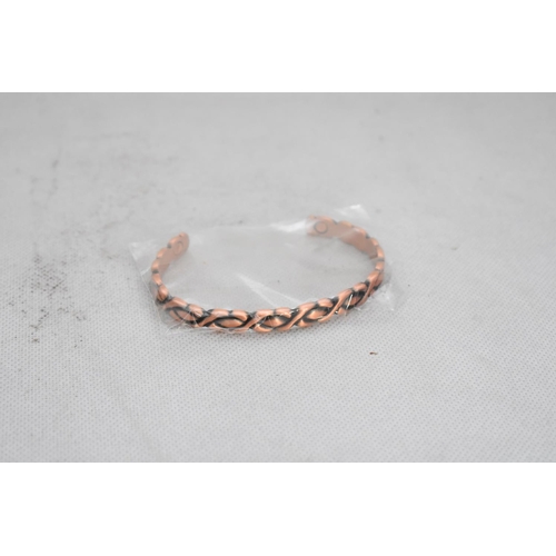 125 - A Quantity of Copper Bracelets