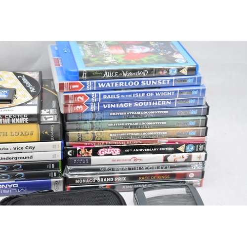 127 - DVD's, A Metal Tin with a Cup and Saucer and gaming Items and a Model Van