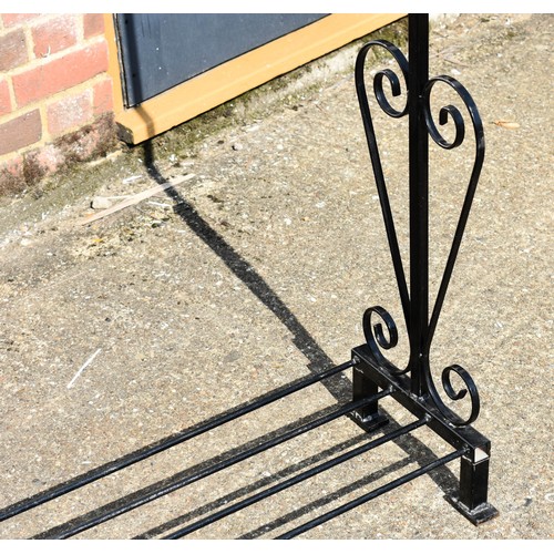 42 - A Black Metal Clothes Rail With Ornate Side Detailing