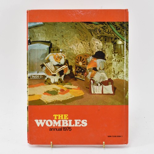 87 - Three Puffin Books, The Wombles and One Wombles Annual 1975