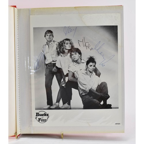 93 - Bucks Fizz Memorabilia, including Tour Programmes ( one signed) and Photo Album with Signatures