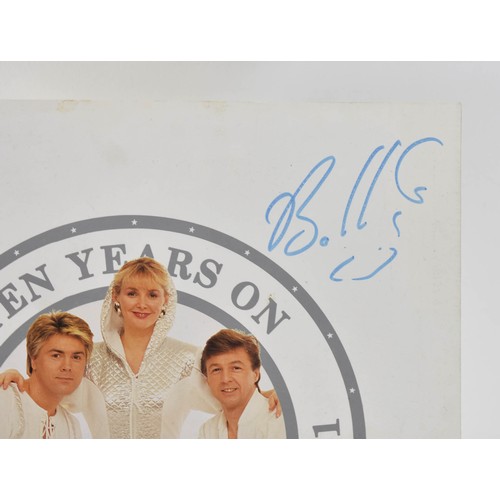 93 - Bucks Fizz Memorabilia, including Tour Programmes ( one signed) and Photo Album with Signatures