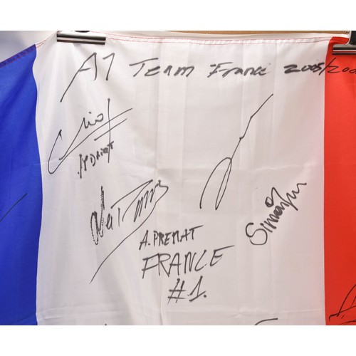 103 - A1 GP French 2005- 2006 French Team Signed Flag and Collection of Related Books and Magazines