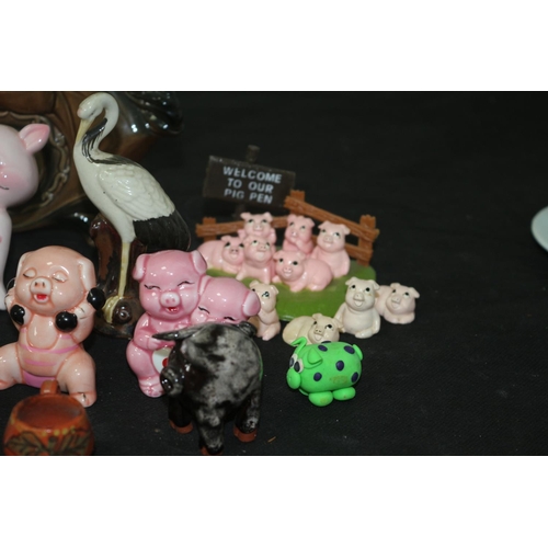 152 - Large Collection of Ornamental Pigs plus other Items of an Ornamental Theme