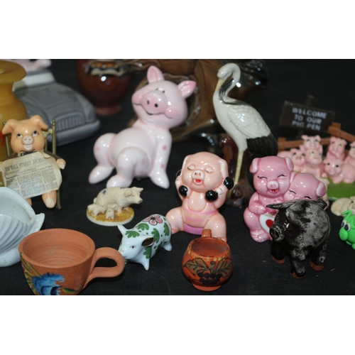 152 - Large Collection of Ornamental Pigs plus other Items of an Ornamental Theme