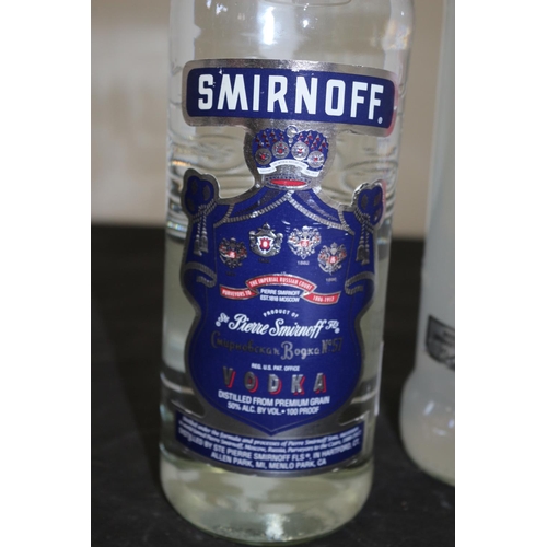 179 - Bottle of Smirnoff Ice 70cl plus Smirnoff No. 57 Blue Label Vodka 1 Litre