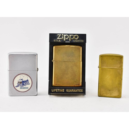 264 - A Collection Of 3 Zippo Lighters, One In Case.