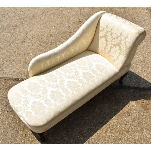 285 - A Small Cream Fabric Chaise Lounge 135cm x 50cm.