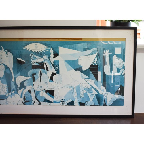 292 - A Framed And Glazed Picasso Guernica Print Size 58cm x 111cm.