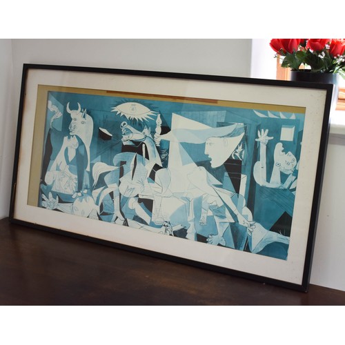 292 - A Framed And Glazed Picasso Guernica Print Size 58cm x 111cm.